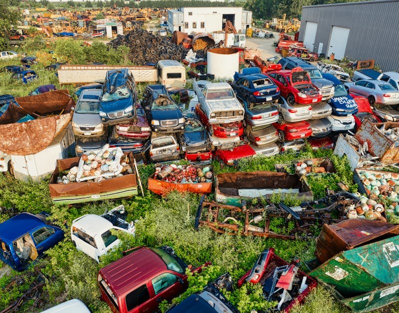 Aerial photograph of a recycling yard filled with old cars and parts, Saint Charles, Minnesota.