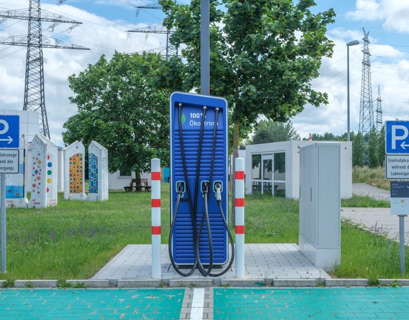 Public charging station with eco-friendly design for electric vehicles.